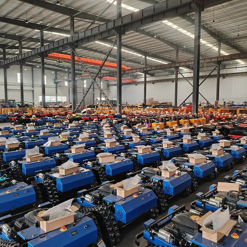 Blue mower units arranged in rows across the factory floor.