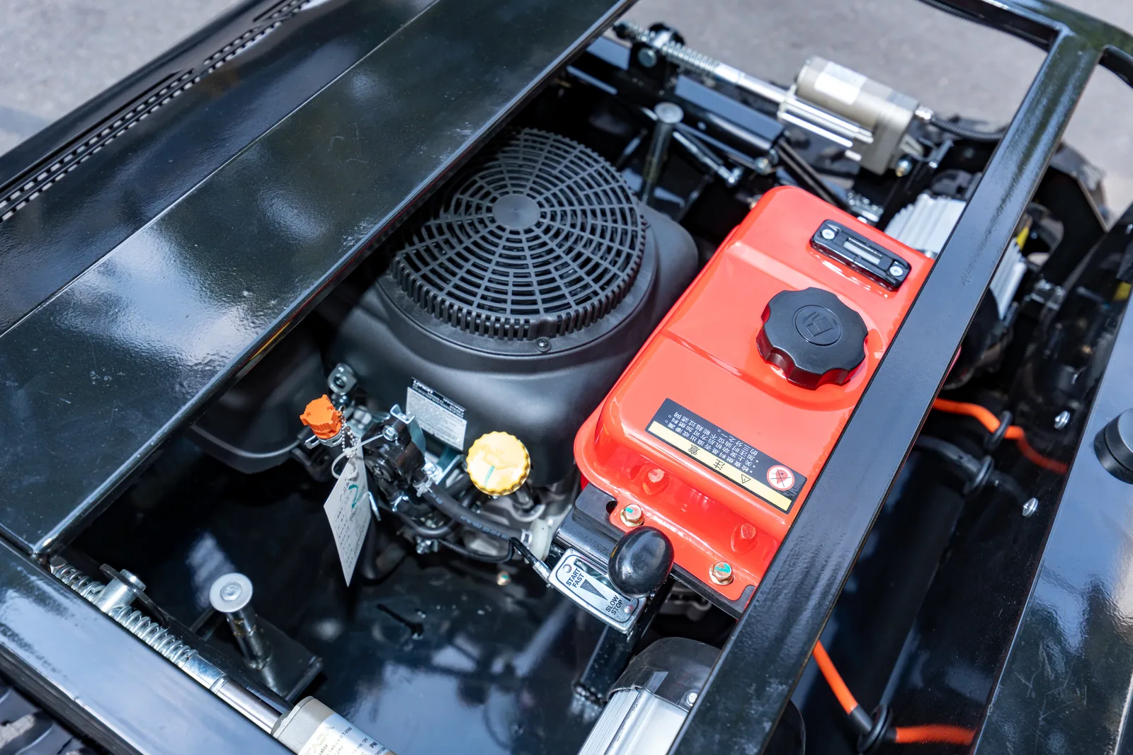 AY-800S engine and fuel tank inside the mower chassis